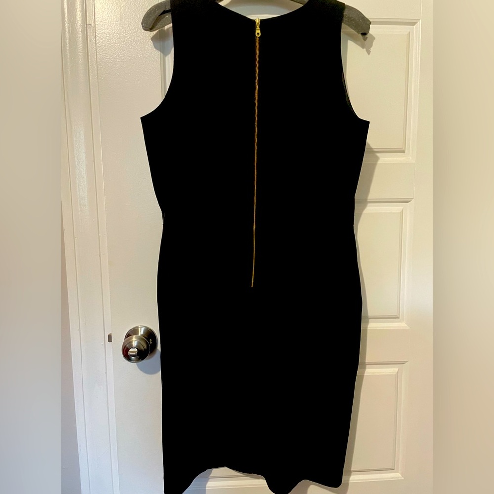 The Limited, US 12 , black with gold accent zipper and it has POCKETS LADIES!!